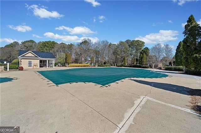 community pool with a patio