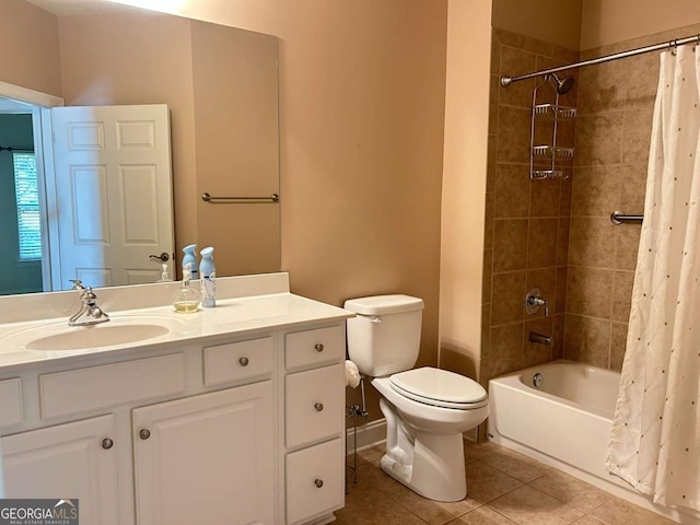 bathroom with tile patterned flooring, toilet, vanity, and shower / bath combo with shower curtain