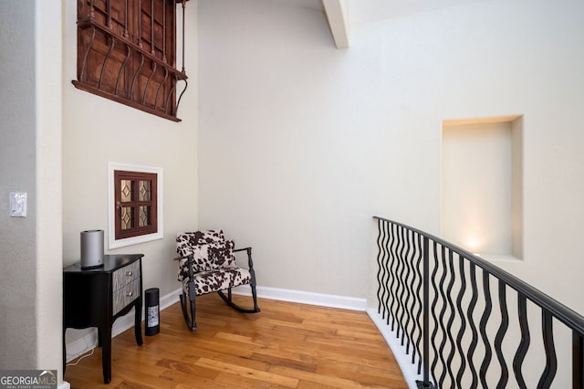 interior space featuring baseboards and light wood-style flooring