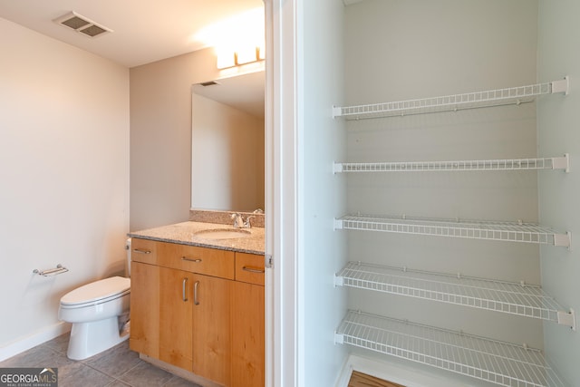 361 17th St Unit 1516, Atlanta, GA 30363 - bathroom with vanity and tile patterned floors