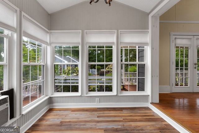 unfurnished sunroom with lofted ceiling