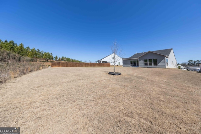 view of yard with fence