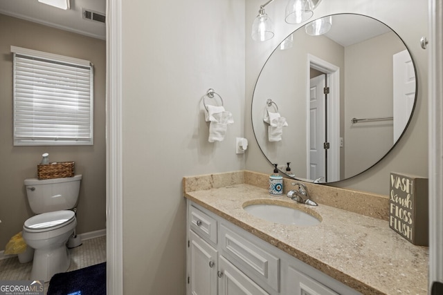 bathroom with tile patterned flooring, visible vents, baseboards, toilet, and vanity