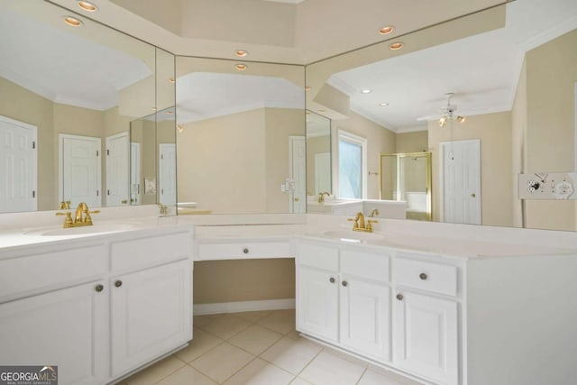 full bath featuring vanity, a ceiling fan, a stall shower, tile patterned flooring, and crown molding