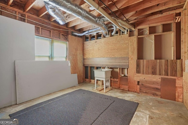 miscellaneous room with a sink