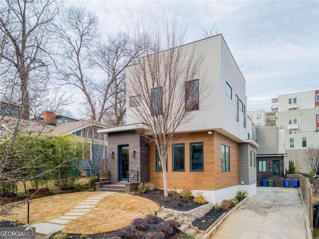 modern home featuring stucco siding