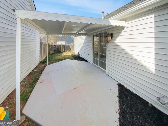 view of patio with fence