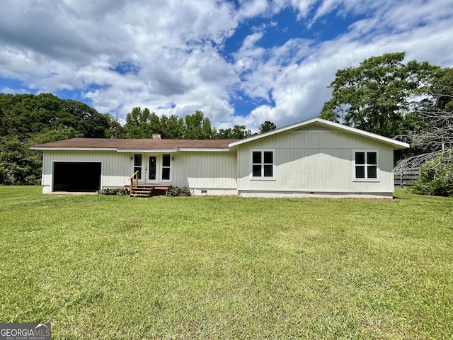 189 Tatum Heights Dr, Lagrange, GA 30240 - back of property featuring a yard, a garage, and crawl space