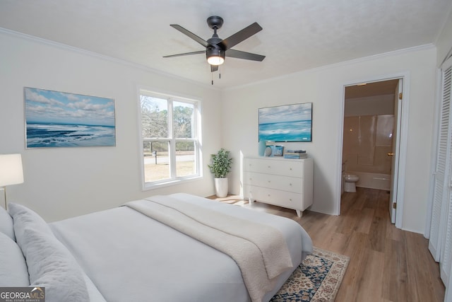 189 Tatum Heights Dr, Lagrange, GA 30240 - bedroom with connected bathroom, light wood-style flooring, a ceiling fan, and ornamental molding