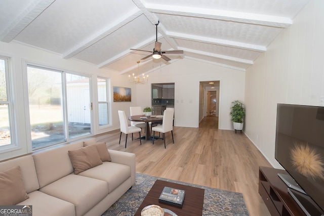 189 Tatum Heights Dr, Lagrange, GA 30240 - living room with light wood-style floors, lofted ceiling with beams, and ceiling fan with notable chandelier