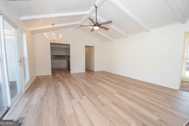 unfurnished living room featuring visible vents, ceiling fan with notable chandelier, lofted ceiling with beams, and light wood-type flooring