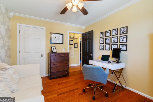 home office featuring ceiling fan, baseboards, wood finished floors, and ornamental molding