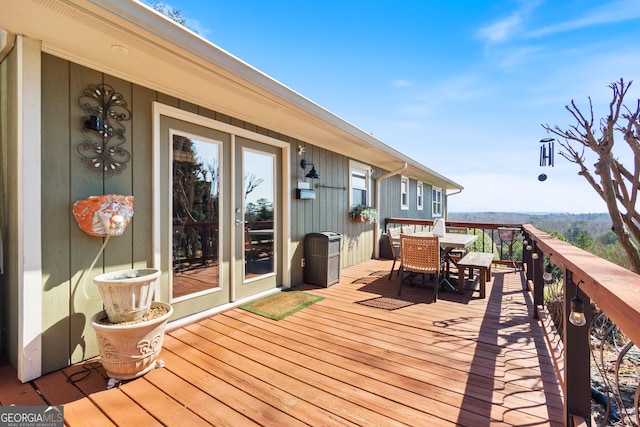 deck featuring outdoor dining space