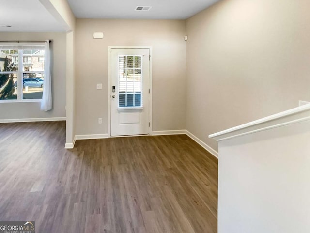 7644 Watson Cir, Locust Grove, GA 30248 - foyer featuring dark wood-style floors and healthy amount of natural light