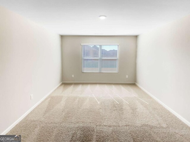 7644 Watson Cir, Locust Grove, GA 30248 - carpeted spare room featuring baseboards