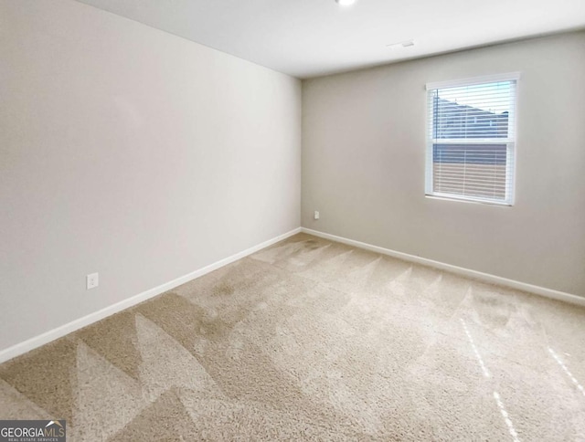 7644 Watson Cir, Locust Grove, GA 30248 - carpeted spare room with baseboards