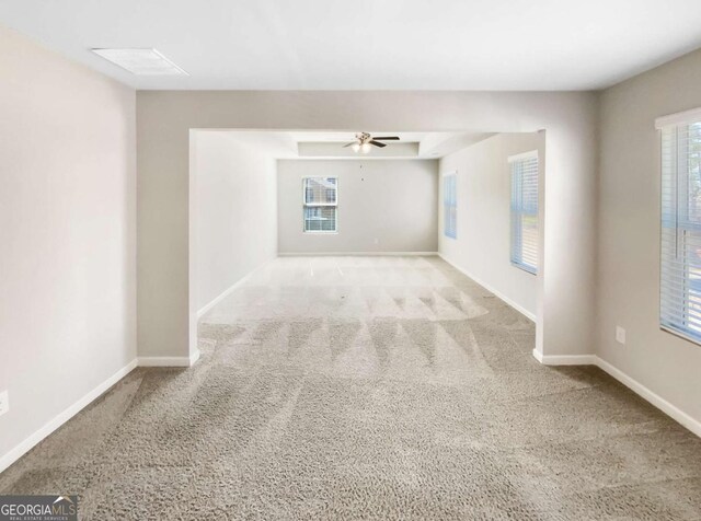 7644 Watson Cir, Locust Grove, GA 30248 - carpeted empty room featuring baseboards and ceiling fan