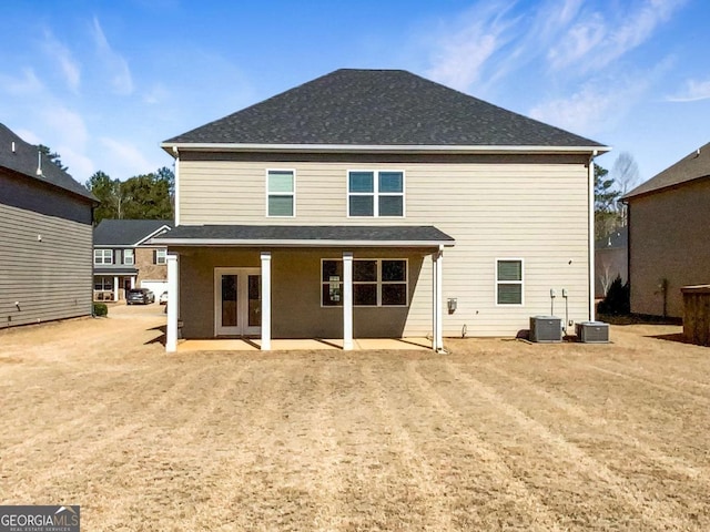 7644 Watson Cir, Locust Grove, GA 30248 - back of property with a patio area and french doors
