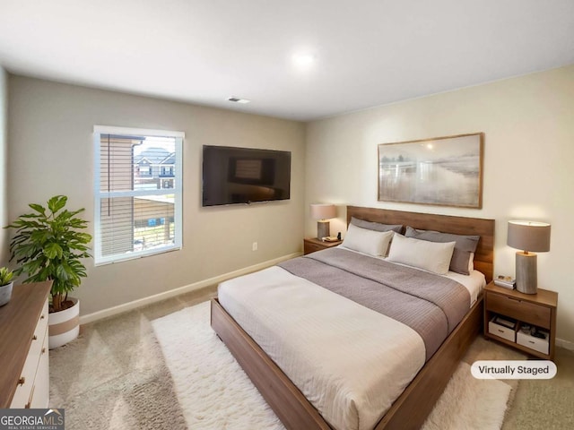 7644 Watson Cir, Locust Grove, GA 30248 - bedroom featuring baseboards and carpet