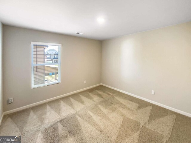 7644 Watson Cir, Locust Grove, GA 30248 - unfurnished room with light carpet