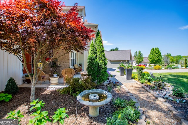 348 N Ridge Ln, Temple, GA 30179 - view of home's exterior with a patio