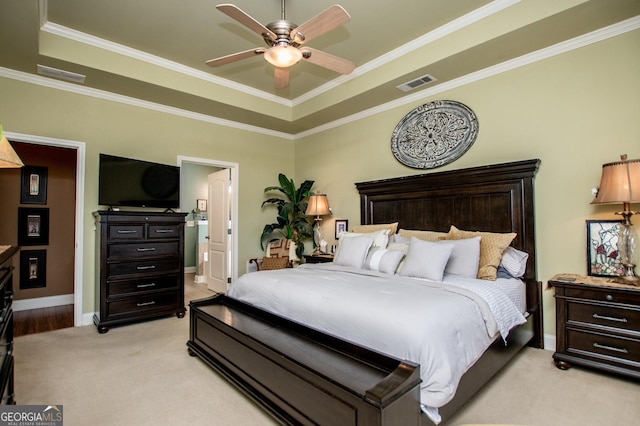 348 N Ridge Ln, Temple, GA 30179 - bedroom featuring ornamental molding, light carpet, visible vents, and a raised ceiling