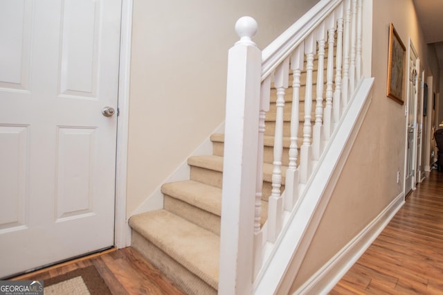 348 N Ridge Ln, Temple, GA 30179 - staircase featuring baseboards and wood finished floors