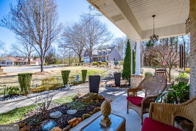 348 N Ridge Ln, Temple, GA 30179 - view of patio / terrace featuring a porch