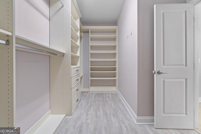 1439 Mill Pointe Ct, Lawrenceville, GA 30043 - spacious closet featuring light wood-type flooring