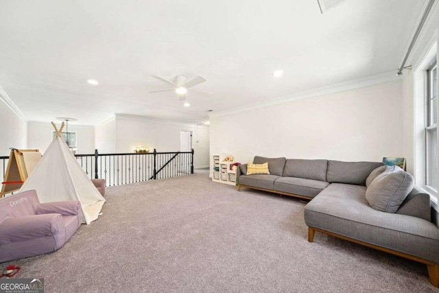 living area featuring carpet flooring, recessed lighting, crown molding, and a ceiling fan