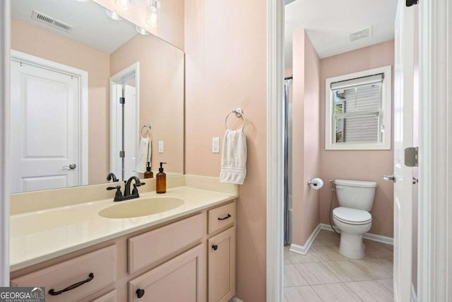 full bathroom featuring visible vents, toilet, vanity, and tile patterned flooring