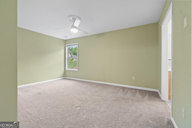 1439 Mill Pointe Ct, Lawrenceville, GA 30043 - unfurnished room with a ceiling fan and carpet flooring