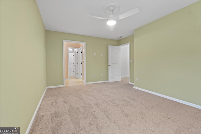 1439 Mill Pointe Ct, Lawrenceville, GA 30043 - unfurnished bedroom featuring carpet floors and a ceiling fan