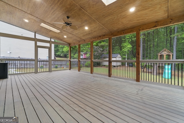 1439 Mill Pointe Ct, Lawrenceville, GA 30043 - deck featuring ceiling fan and a storage unit