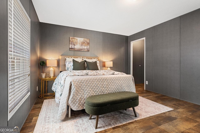 bedroom with wood finished floors