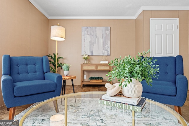 sitting room featuring ornamental molding