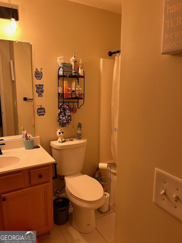 full bath with vanity, curtained shower, toilet, and tile patterned flooring