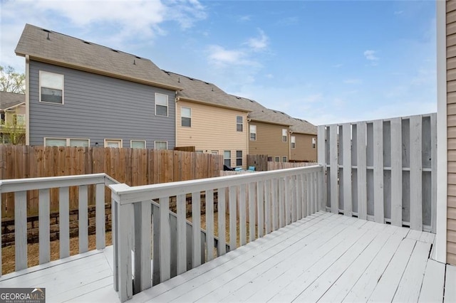 wooden deck featuring fence