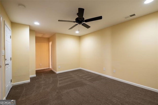 empty room featuring ceiling fan, recessed lighting, visible vents, and baseboards