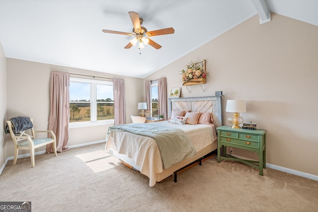 bedroom featuring lofted ceiling with beams, baseboards, light carpet, and ceiling fan