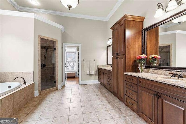 full bathroom with tile patterned flooring, a garden tub, ornamental molding, a stall shower, and vanity