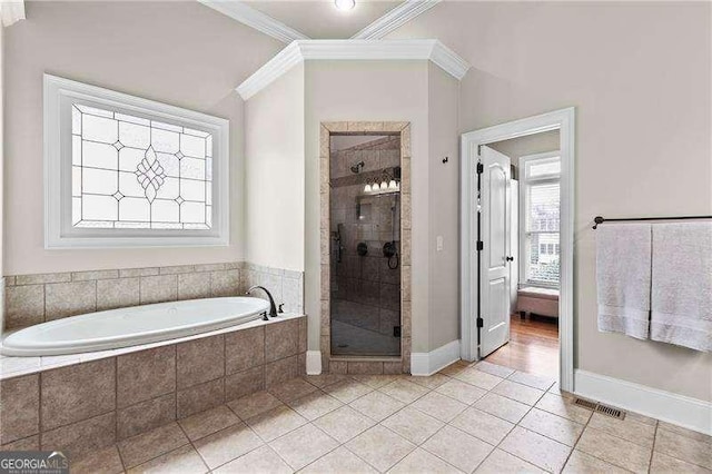 full bathroom featuring visible vents, ornamental molding, tile patterned flooring, a shower stall, and a garden tub