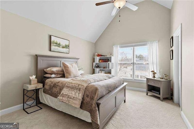 bedroom featuring high vaulted ceiling, a ceiling fan, baseboards, and light carpet