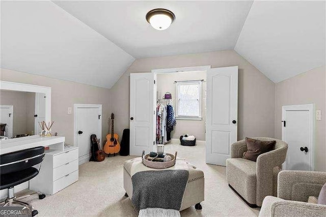 interior space featuring light carpet and lofted ceiling