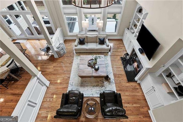 living room featuring wood finished floors and baseboards