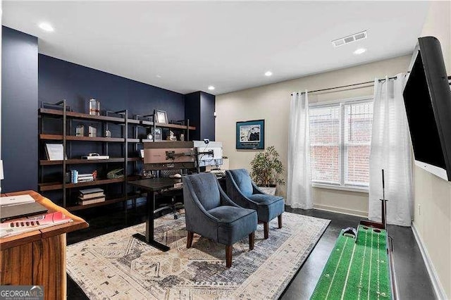 office featuring recessed lighting, visible vents, and baseboards