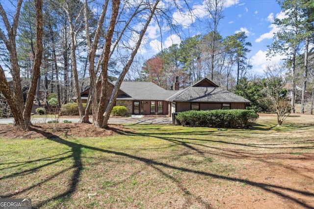 view of front of home with a front yard