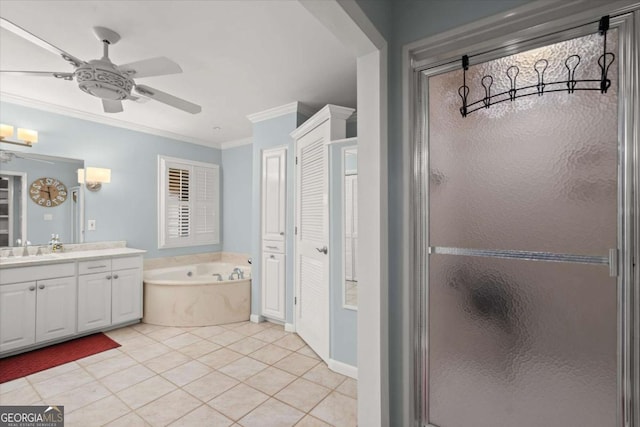 bathroom featuring vanity, a ceiling fan, ornamental molding, a shower stall, and a garden tub