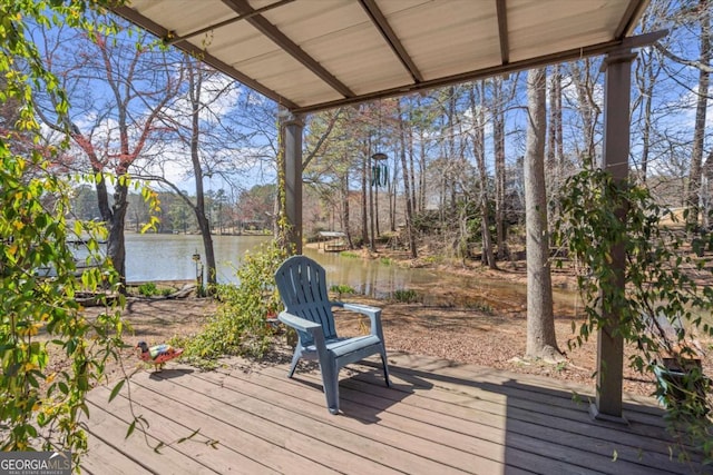 wooden terrace with a water view