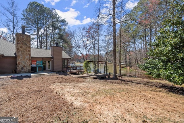 view of yard featuring a deck